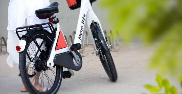 a Metro bike propped up on a kick stand